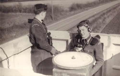 Vernon Whall (right) and colleague at the Reepham ROC post, pictured around 1958. The observers would use binoculars and paper maps to plot the path of Soviet aircraft. Photo: Evelyn Whall