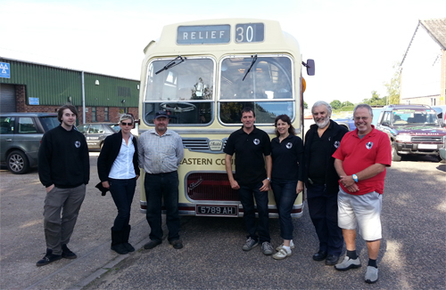 The Panther Brewery team with Claire and Andrew Elliott of South Fork Farm in front of the 1959 Bristol coach in which Richard Dixon of Eastern Transport Collection brought visitors from Norwich to the Norfolk Food & Drink Festival event held in Reepham