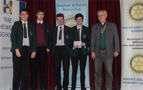 Left to right: Members of the award-winning Reepham High School & College team are Riley Durham, George Marshall, Callum Bowen-Jones and Theo Gwynn, together with Revd Philip Young, president of the Rotary Club of Norwich St Edmund. (Photos: '© John Tym)
