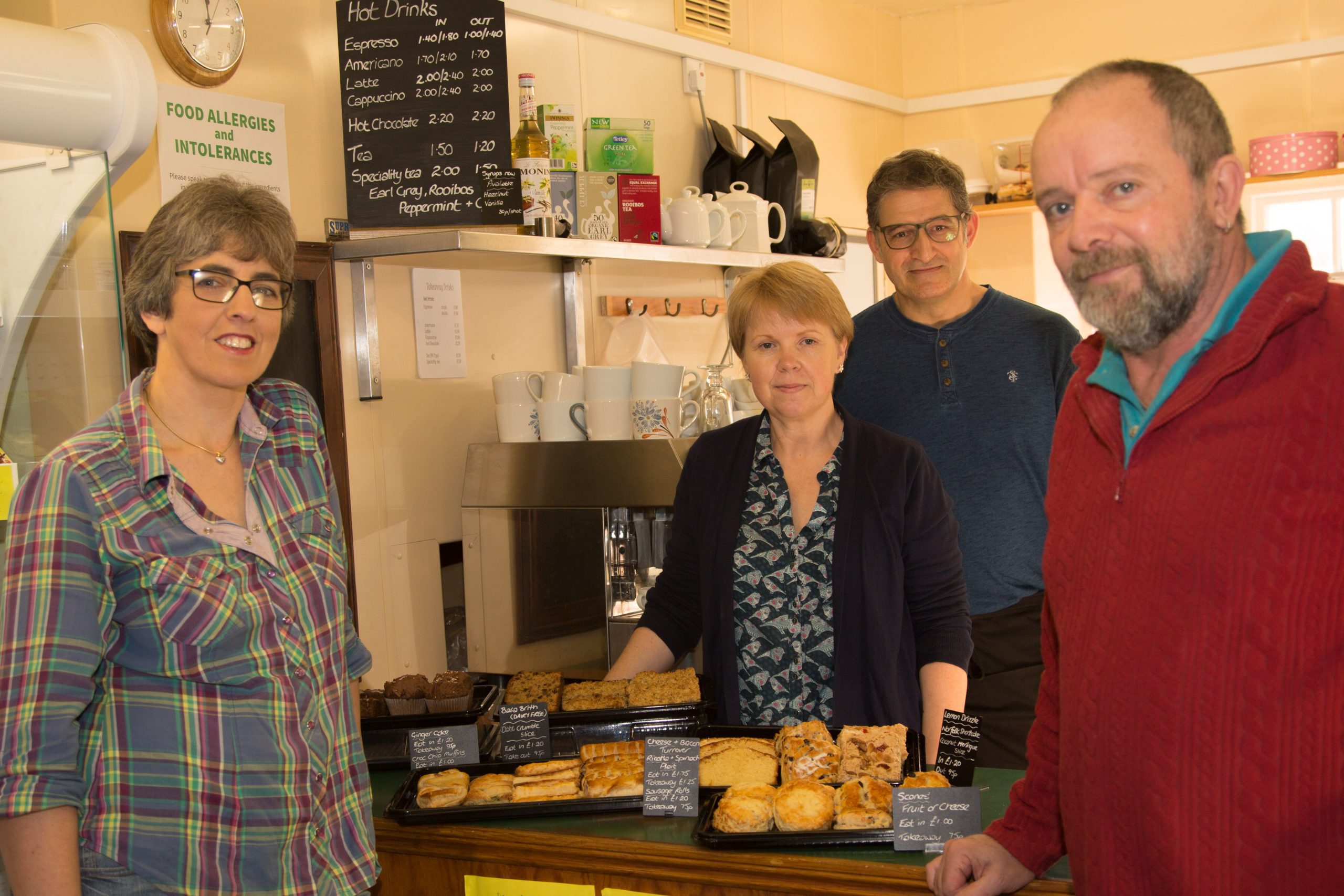 Vanessa (left) and George Hilliard (right), new proprietors of Diane's Pantry, Market Place, Reepham, with employees Rachel and Neil. Photo: John Tym