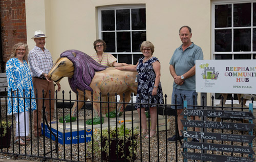 Left to right: Tina Pashley, Ian Kenvyn and Polly Brockis of the Bircham Centre pictured with Brenda Gostling and Mark Bridges from the Reepham Festival team that started the campaign to bring Prince to Reepham. Photo: John Tym