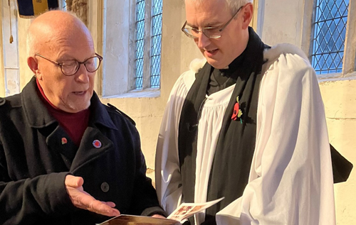 Revd Andrew Whitehead (right) and Nigel Boldero discussing the plans for the church.