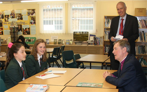 The Rt Revd Jonathan Meyrick, Bishop of Lynn (seated right) being interviewed by student journalists for the RHSC Review as Reepham High School & College principal Mark Farrar looks on