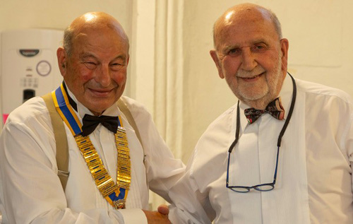 Coen van Beuningen (left) receiving his seal of office from outgoing president Peter Williams. Photo: John Tym