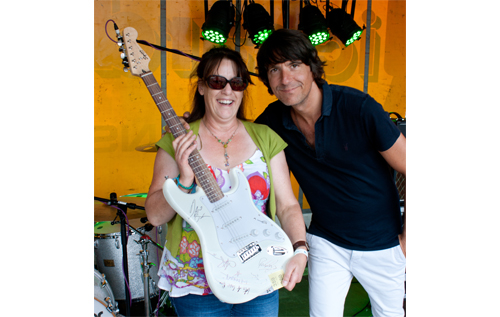 Jill Marshall-Somerville pictured with the Squier Stratocaster and Toploader guitarist Dan Hipgrave. Photo: Tim Moll