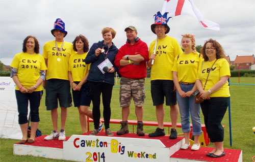Members of the Cawston Big Weekend committee with Kirsteen Thorne and Ian Forster (centre) from BBC Radio Norfolk's Treasure Quest. Left to right: Theresa Carman, Paul Wilkinson, Trudy Wilkinson, Stephen Bridges, Laura Bridges and Jane Bridges