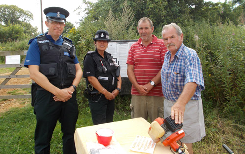 Left to right: PCSO Stephen Bridges and PC Julia Benson with Reepham allotment holders Desmond Burton and Taff Rees