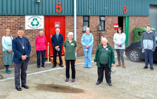 Some of the volunteers, staff and trustees, together with new patron, the Bishop of Norwich, Rt Rev'd Graham Usher, at the reopening of Scrapbox. Photos: Andrew Whitehead