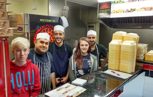 Mehmet Bener (second from left) and staff at Reepham Pizza House, Unit 1, Sun House, Market Place, Reepham
