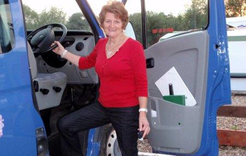 Jeannette Overton climbs aboard the Reepham Rover for the final time as a volunteer driver