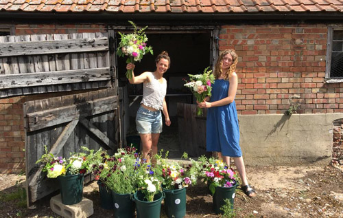 Salle Moor Market Garden also sells seasonal cut flowers. Pictured here are co-directors Megan Davis (left) and Helen Cherry. Photo: Salle Moor Market Garden