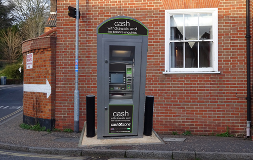 What a combined public payphone and ATM cash machine on Townsend Corner could look like
