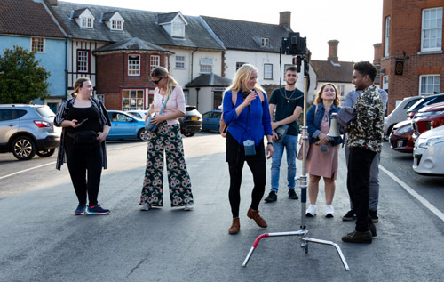 Losing Us film crew in Reepham Market Place: (left to right): Mollie Nash, make-up artist; Katrine Boldero, costume designer; Teele Dunkley, director; Elliott Tooke, producer's assistant; Mrs Mustafi; Anton Kamillus, co-producer. Photo: Lesley van Dijk