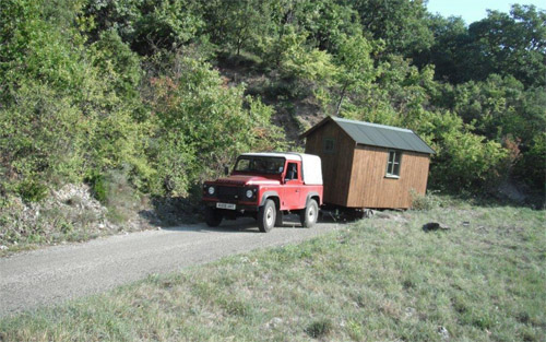 The last stage of the hut's journey was a two-mile tow up a hill following an 800-mile trip by road to the south of France